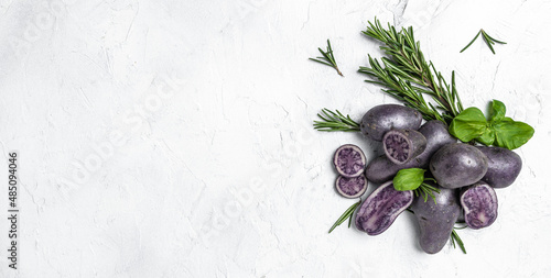 Raw sweet potatoes or batatas isolated on white background. Batata potato. vegan food ingredient. Ipomoea batatas. Batata potato. Long banner format. top view