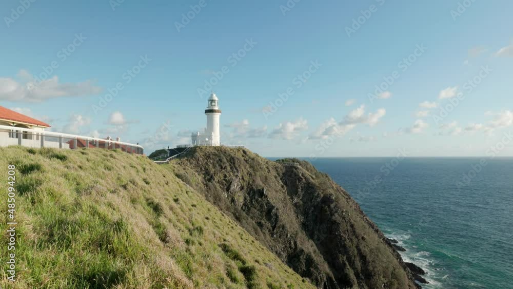 a spring morning wide shot of the historic lighthouse at cape byron of byron bay in northern nsw, australia a spring morning wide shot of the historic lighthouse at cape byron of byron bay in northern nsw, australia