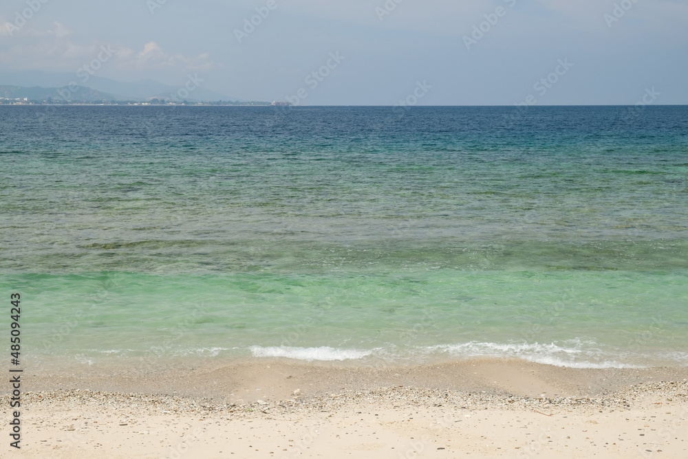 Tropical exotic paradise view of Cristo Rei Beach in Dili, Timor Leste. Tropical exotic paradise view of Cristo Rei Beach in Dili, Timor Leste.