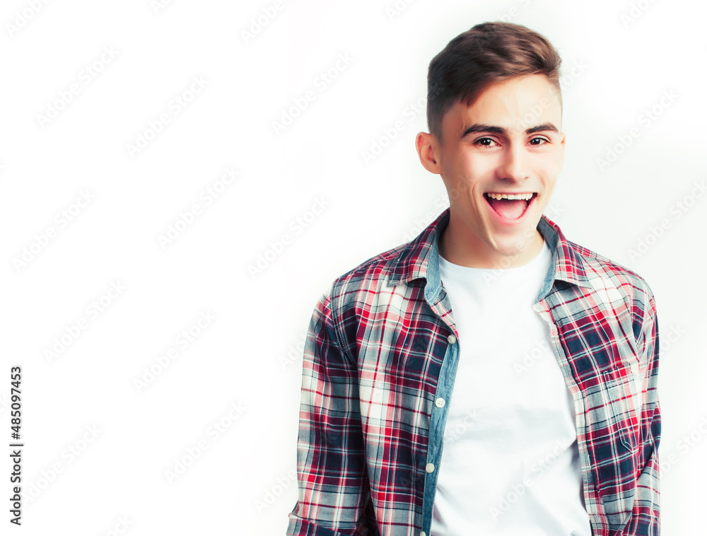 young handsome teenage hipster guy posing emotional, happy smiling against white background isolated, lifestyle people concept young handsome teenage hipster guy posing emotional, happy smiling against white background isolated, lifestyle people concept