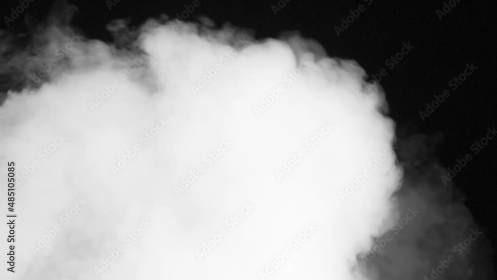 Inversion of White Smoke Stream. A jet of dense white smoke is blown away by a stream of air Inversion of White Smoke Stream. A jet of dense white smoke is blown away by a stream of air