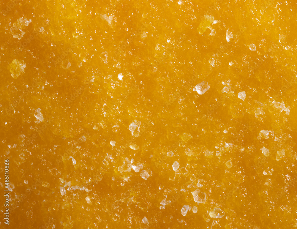 Dried yellow mango pulp as background. Stock Photo Adobe Stock