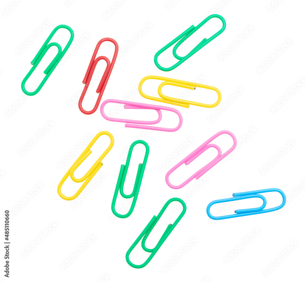 Multi-colored paper clips isolated on a white Multi-colored paper clips isolated on a white