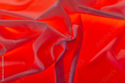 Red material as an abstract background.