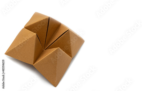 Brown paper fortune teller isolated on white background photo