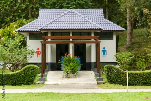 Toilet house in a green tropical park of Kuala Lumpur, Malaysia © Turner