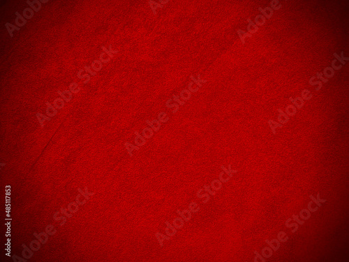 Dark red velvet fabric texture used as background. Empty dark red fabric background of soft and smooth textile material. There is space for text...