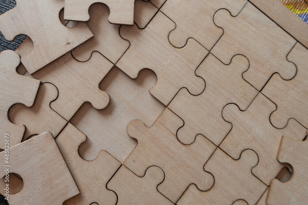 jigsaw on the floor. concept of missing and key success jigsaw on the floor. concept of missing and key success