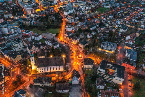 drone view of a illuminated town 