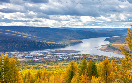 View of the village of Tura - the administrative center of the Evenki district of the Krasnoyarsk Territory in autumn. photo