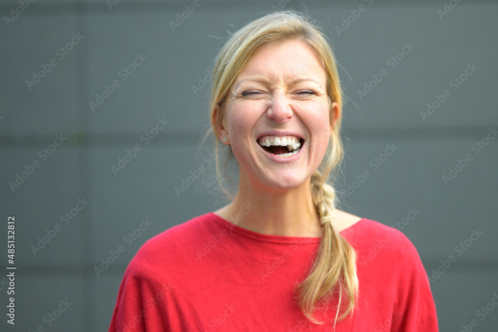 Blond woman having fun with bubblegum Blond woman having fun with bubblegum
