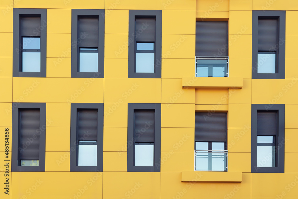 Obraz premium Urban architecture. Close up of facade of a residential building 