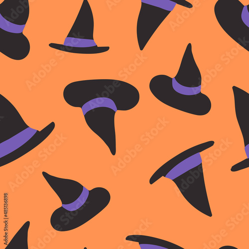 Halloween seamless vector repeat pattern with witch hats with purple ribbons tossed on bright orange background. Adorable cute modern sophisticated Halloween backdrop. 2 directional all over pattern.