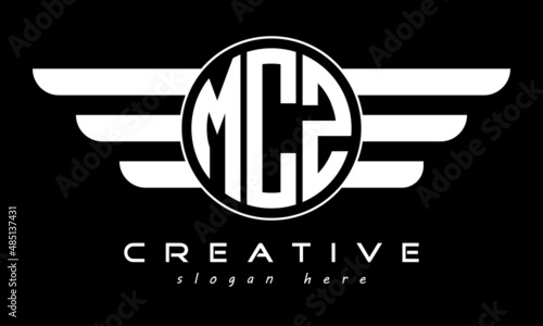 MCZ three letter monogram type circle letter logo with wings vector template. photo