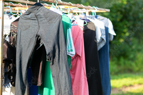 clothes hanging on a hanger.