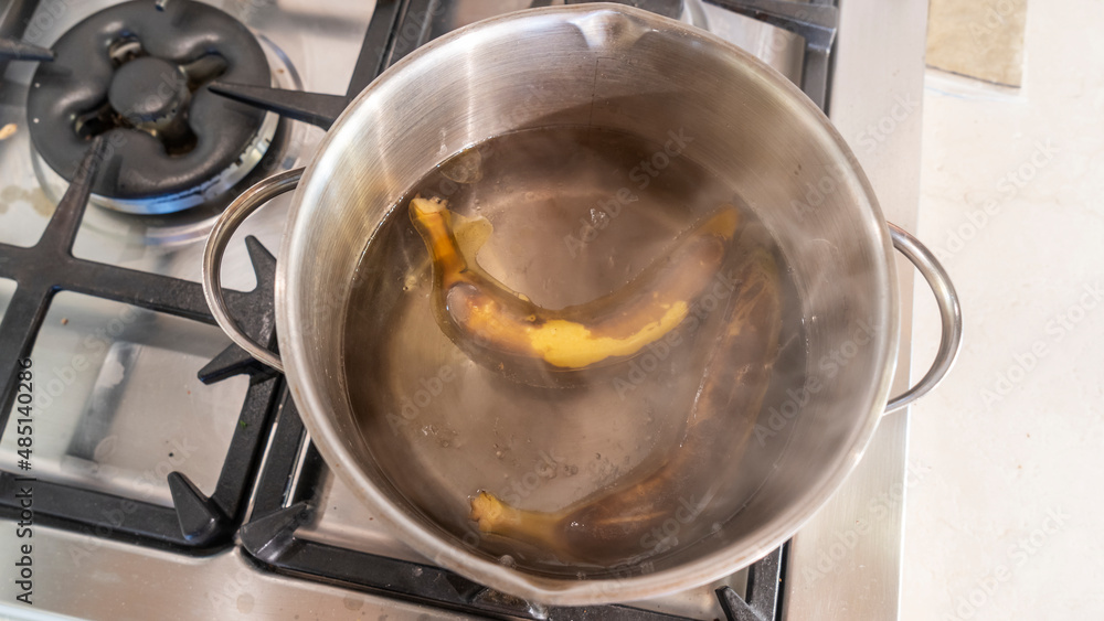 Boiled banana in the pot. High calories snack. Traditional Thai dessert. Boiled banana with banana leaf. Boiled banana in the pot. High calories snack. Traditional Thai dessert. Boiled banana with banana leaf.