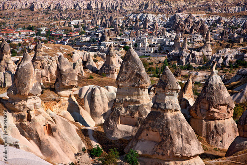 Partial view of picturesque Goreme village surrounded by the spectacular landscape of Cappadocia on the edge of Pigeon valley, Nevsehir, Turkey 