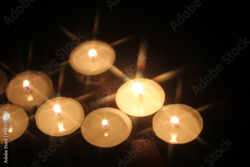 Wallpaper Mural Light several candles on a wooden table Torontodigital.ca