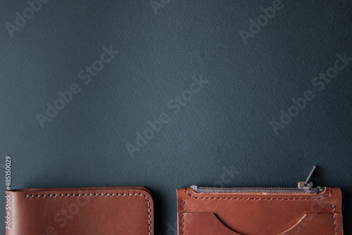 handmade item made of brown leather on a black background close-up with a place for an inscription