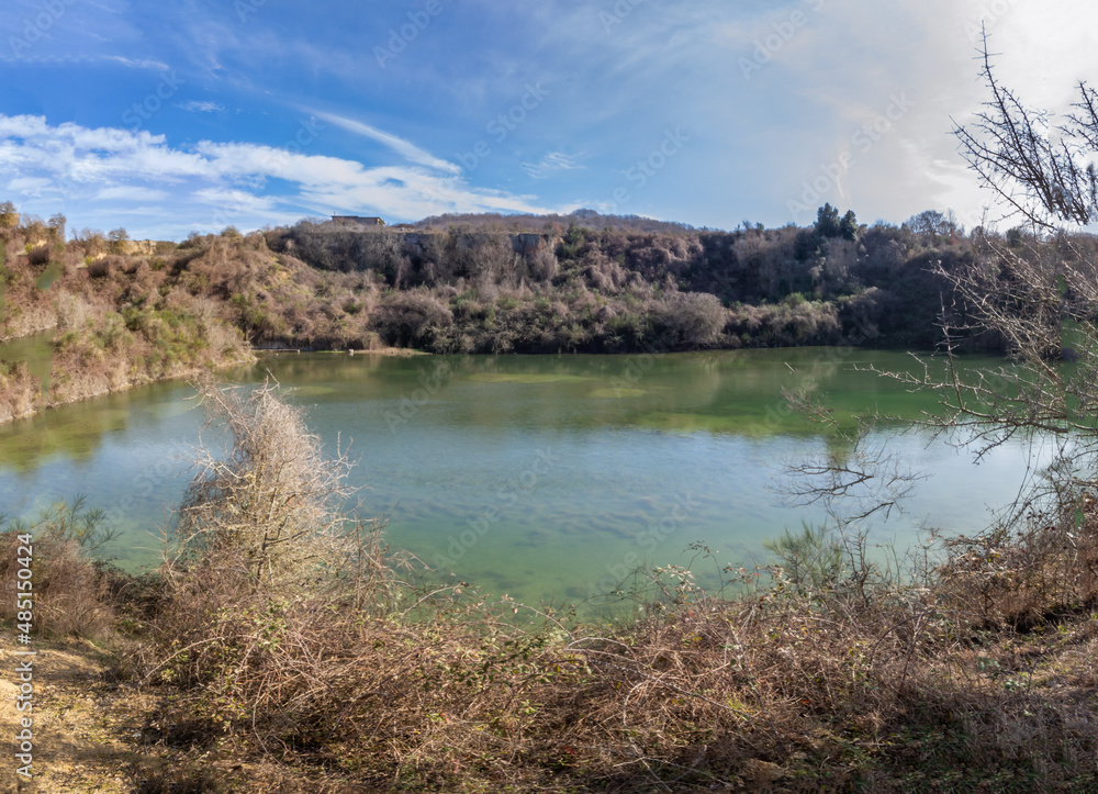 The wetland area of Mercareccia.One in particular, occupy the bottom of a former disused tuff quarry that spontaneously re-naturalised, Nature landscape .Canale Monterano,Italy.