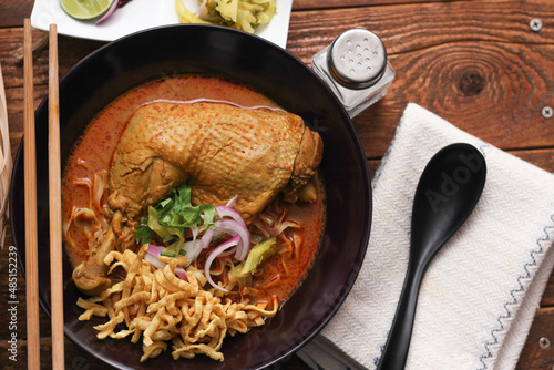 Fotografie Northern Thai Style Curried Noodle Soup with Chicken or what we call in thai Khao Soi