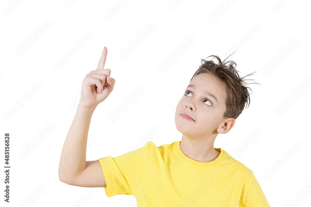 Isolated on a white background portrait of a boy who points up with his finger. Isolated on a white background portrait of a boy who points up with his finger.