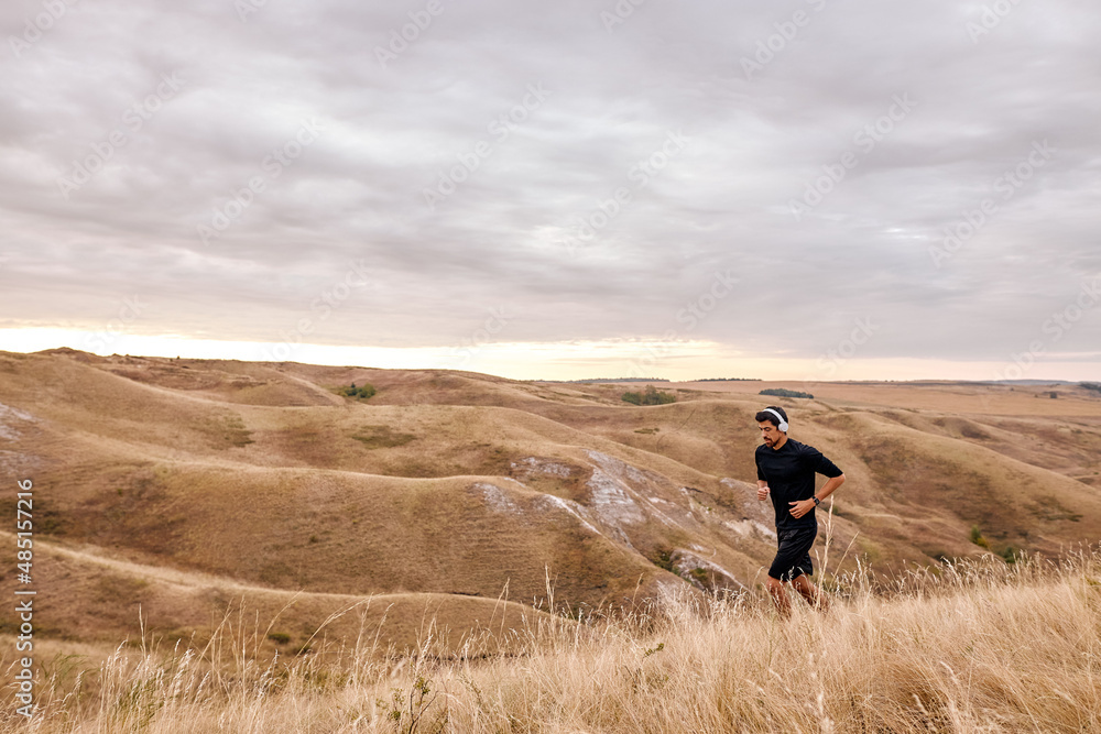 Sportsman In Sportswear Is Running, Keep Fit In Early Morning, Lead Healthy Lifestyle.Young Caucasian Fit Male Is Full Of Energy And Enthusiasm, Begind The Day With Sport. Freedom, Fitness, Lifestyle