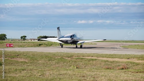 Small Aircraft Taxis onto Runway