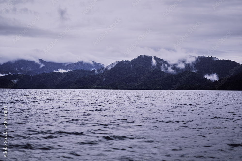 Beautiful landscape with lake, mountains and natural attractions on Cheow Lan Lake at Khao Sok National Park, Surat Thani Province, Thailand.