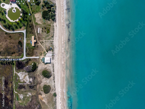 Aerial top down view of almyros beach in north corfu greece