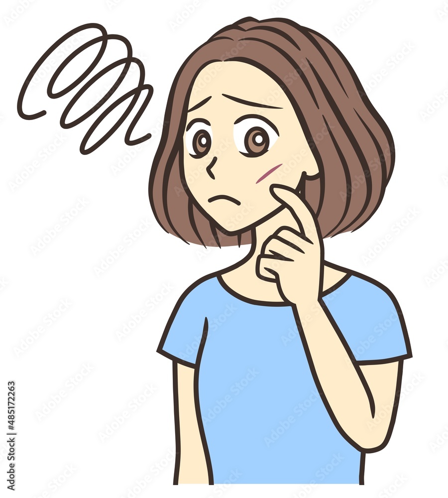 A young woman looking at a scar on her cheek with a sad feeling