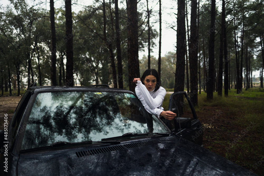 © eren - woman photographed in classic car