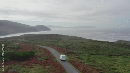Drone aerial view of a camper van in Galicia, Spain photo