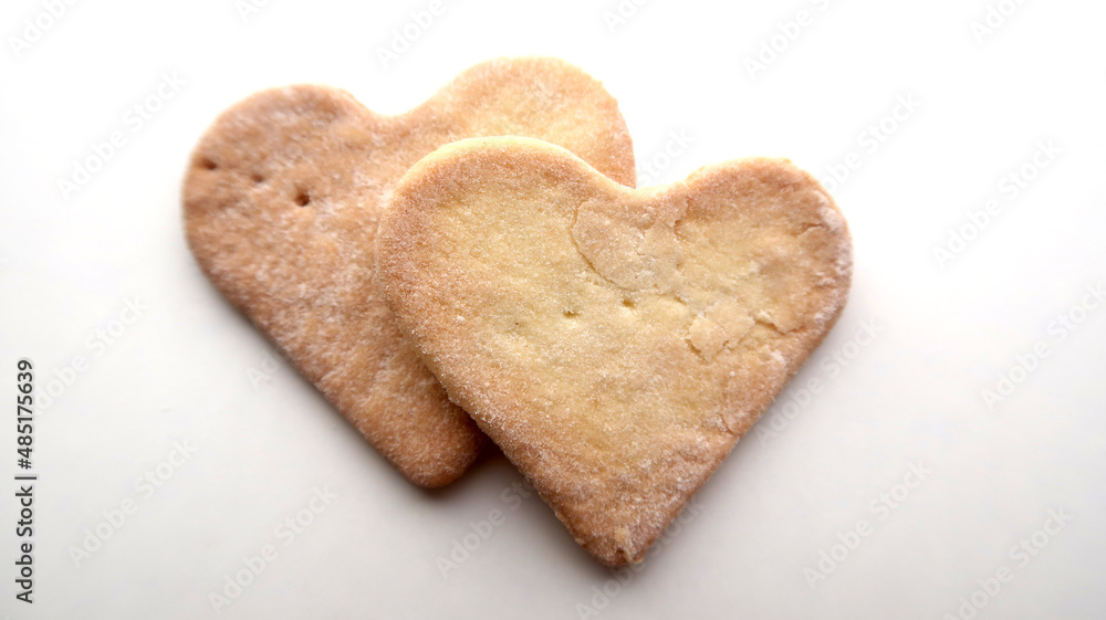 Two ruddy warm cookies on a white background for valentine's day