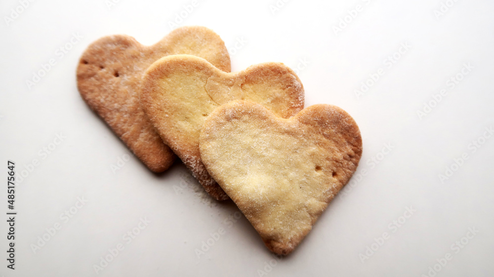 Three ruddy warm cookies on a white background for valentine's day Three ruddy warm cookies on a white background for valentine's day