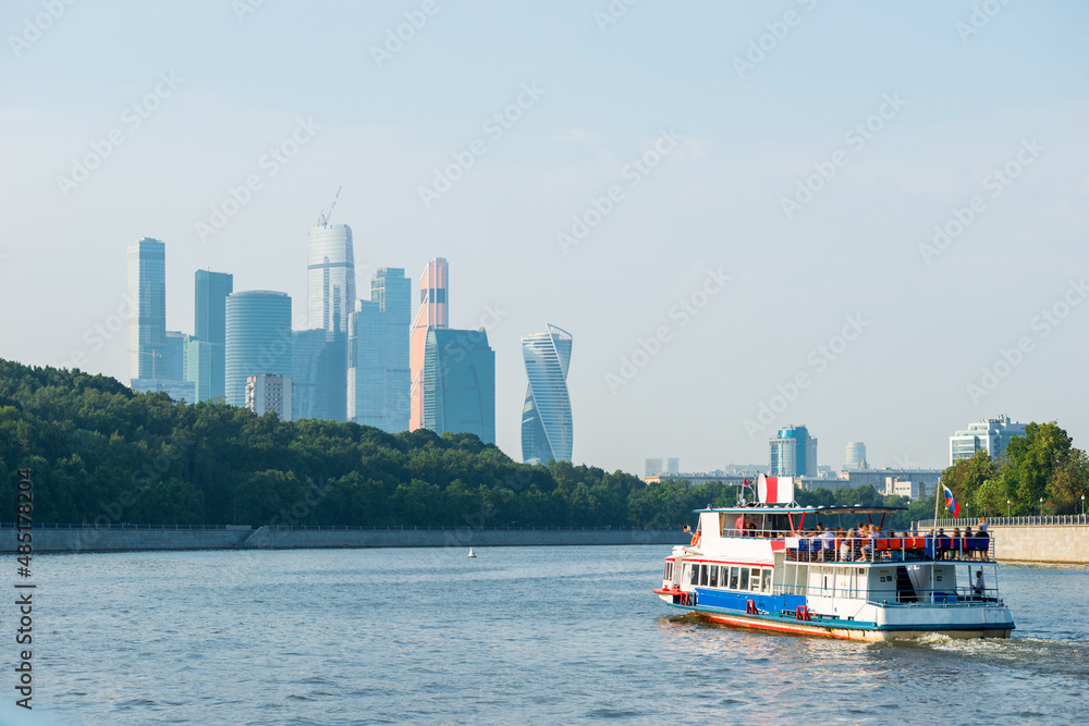pleasure boat on the Moskva River with a view of the Moscow City, Russia