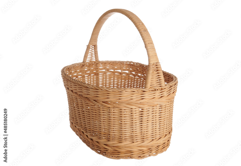 Wicker wooden basket - isolated photo on a white background. Wooden basket made with natural materials. Rustic style of light wicker basket. Traditional rustic basket container for shopping.