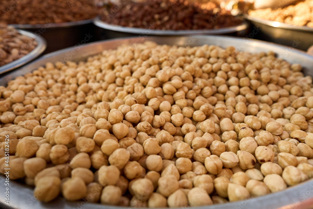 hazelnuts in bowl at street market. High quality photo hazelnuts in bowl at street market. High quality photo