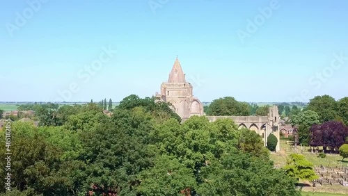 Aerial footage of Crowland Abbey, Lincolnshire, Peterborough on a glorious summer day with perfect blue sky photo