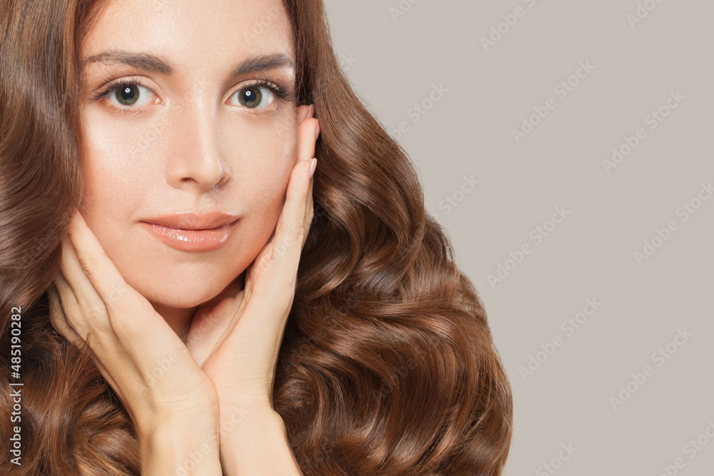 Nice female face closeup. Smiling woman with curly hair Nice female face closeup. Smiling woman with curly hair
