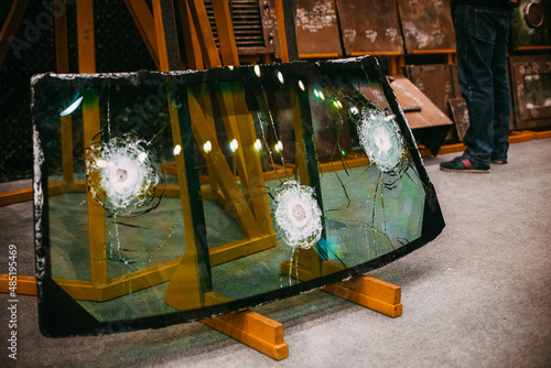 Bulletproof glass after results of various calibers photo