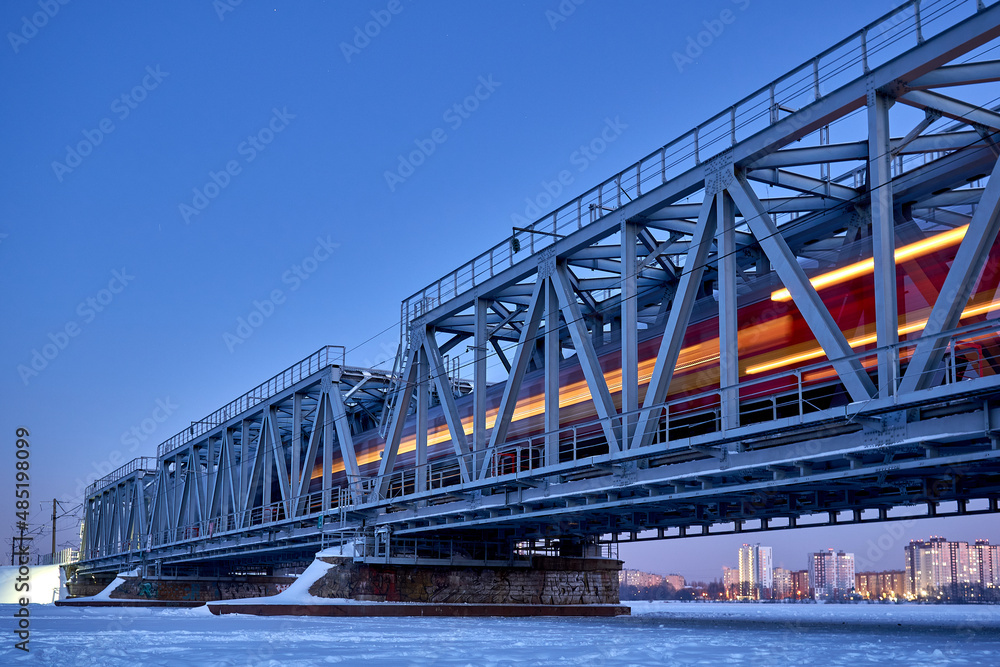 Train movement across the Railway bridge in Voronezh in winter