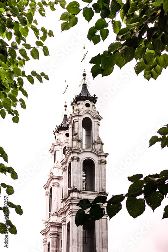 Bell tower of the Church of Michael the Archangel a Catholic church in the city of Oshmyany, Grodno region, Belarus photo