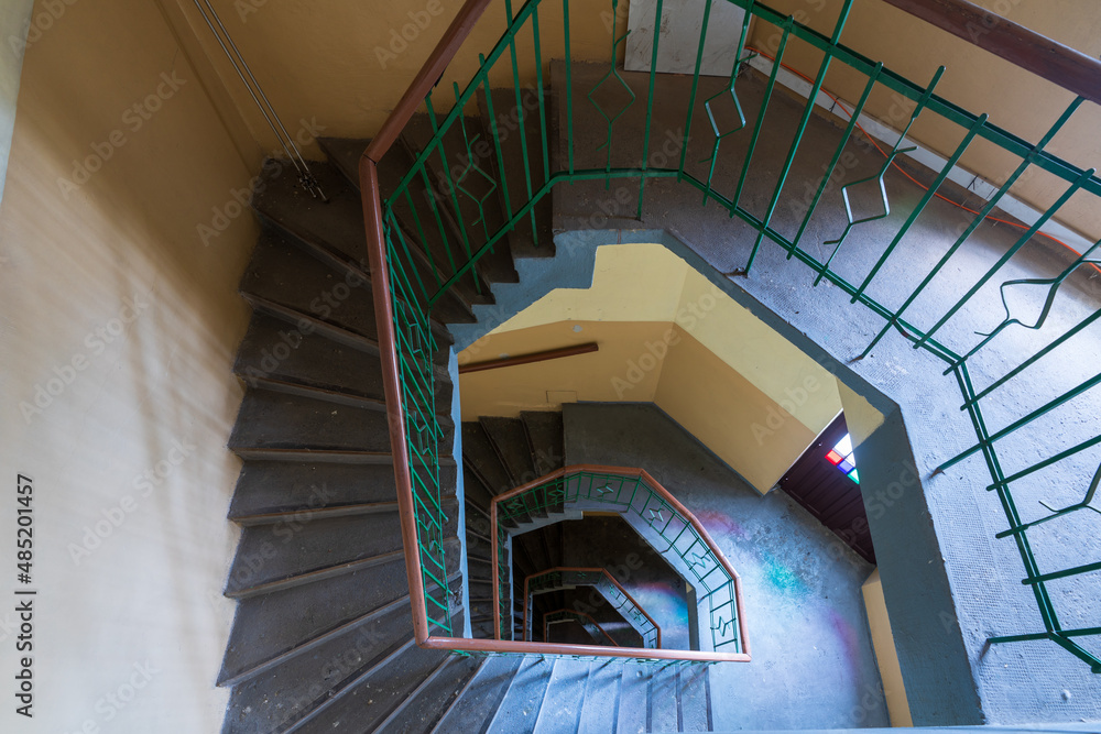 Fototapeta premium Krakow, Poland, December 17, 2021; A staircase in an old historic tenement house in Krakow.