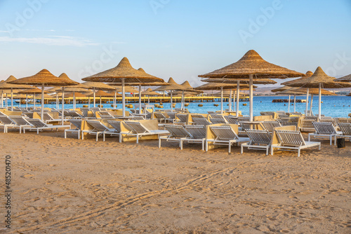 , Hurghada, Egypt. .Swimming pool and accommodation at tropical resort. Buildings, swimming pools and a recreation area by the red sea.