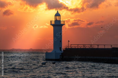 Lighthouse photographed with the sunset in the background 