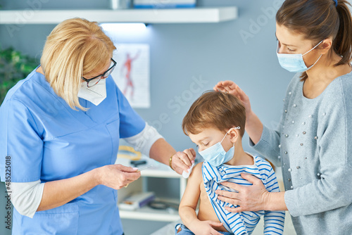 Young kids during vaccination in hospital