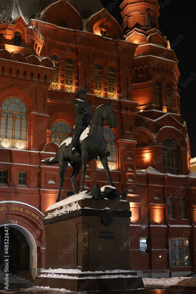 Fototapeta premium Monument to Marshal Georgy Zhukov on red square in Moscow, Russia at night