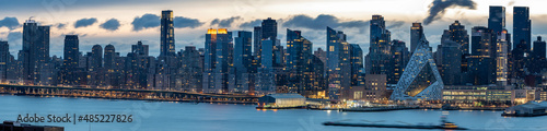 NYC skyline panorama photo, perfect for website design, early morning long exposure technique.