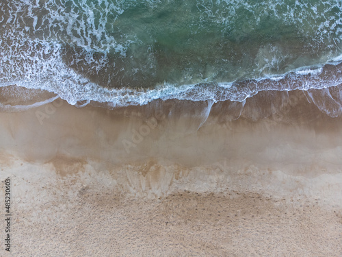 Incredible beach in the middle of nature, Atlantic forest. Praia do Moçambique, Rio Vermelho, Florianópolis, Santa Catarina, Brazil - drone view, top view photo